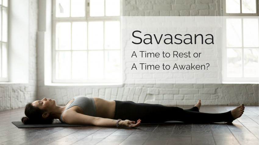 A woman practicing yoga in Corpse Pose (Savasana)
