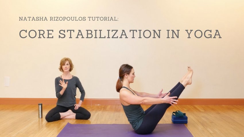 How to Do Boat Pose in Yoga (Navasana) - Free Online Yoga Video Natasha Rizopoulos cuing yoga student in navasana boat pose video tutorial