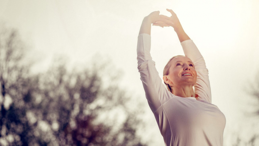 yoga woman stretching after a good night's sleep