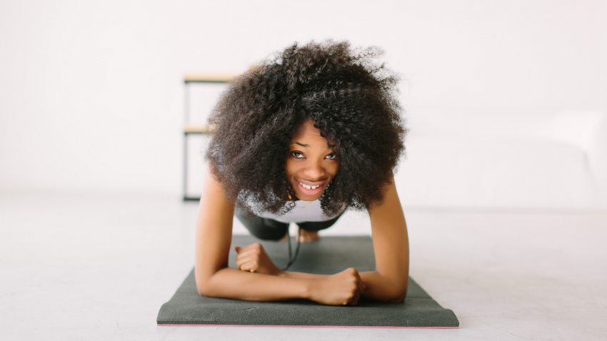 Woman in Plank Pose (Phalakasana) yoga to reframe negative thinking Woman in Plank Pose (Phalakasana) yoga to reframe negative thinking