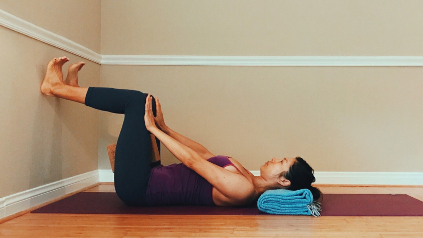 woman practicing yoga for diastasis recti