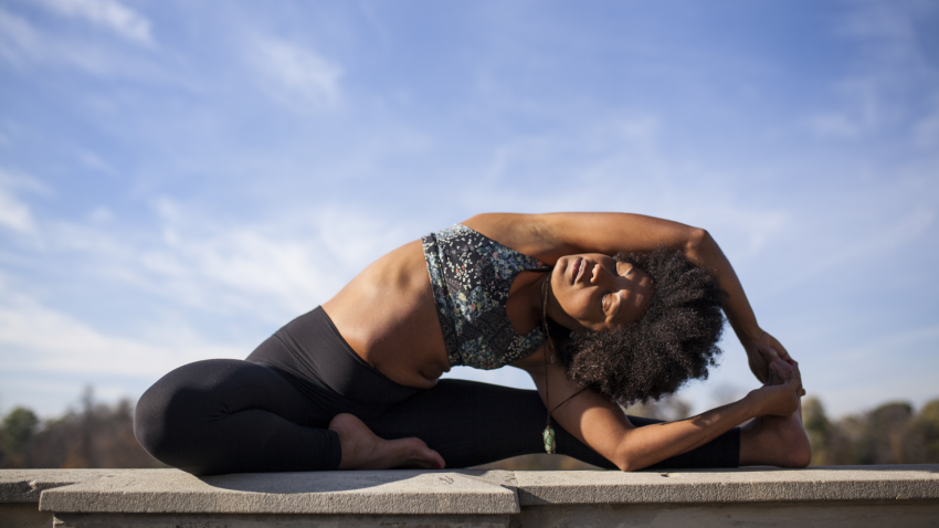 Yoga woman practicing Head-to-Knee Pose (Janu Sirsasana) wisdom Yoga woman practicing Head-to-Knee Pose (Janu Sirsasana) wisdom