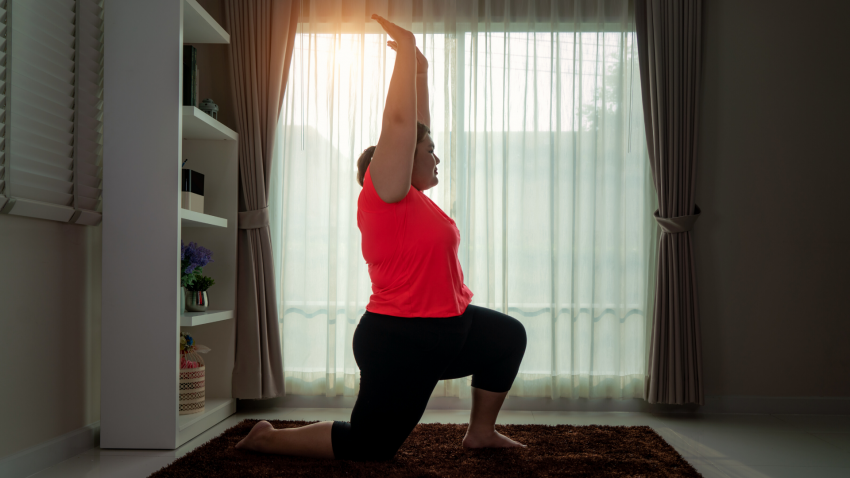 Yoga woman for lower back pain in Low Lunge Pose (Anjaneyasana) Yoga woman for lower back pain in Low Lunge Pose (Anjaneyasana)