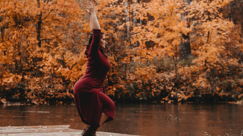Woman practicing yoga for healthy knees Chair Pose (Utkatasana)