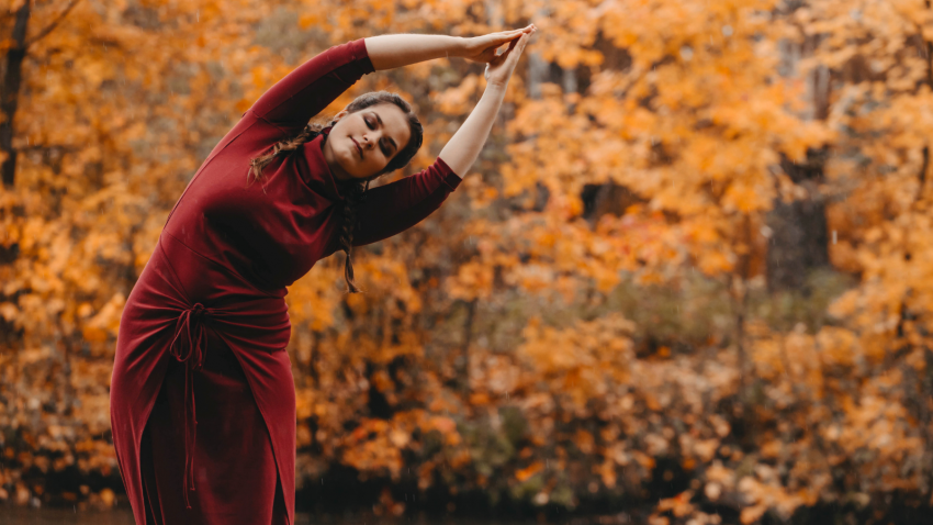 Yoga student in nature experiencing the abundance of life