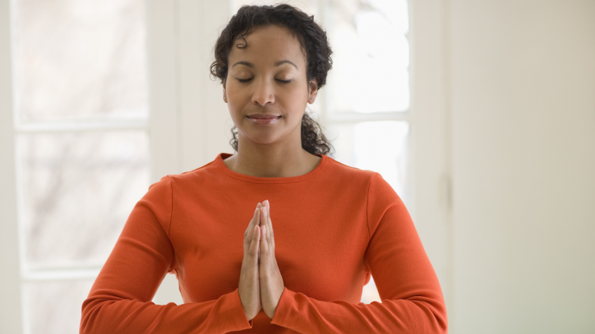Woman practicing yoga meditation. Woman practicing yoga meditation.