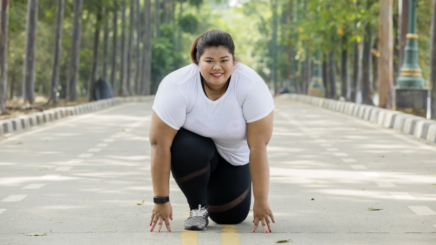 Woman practicing yoga for fibromyalgia and fatigue