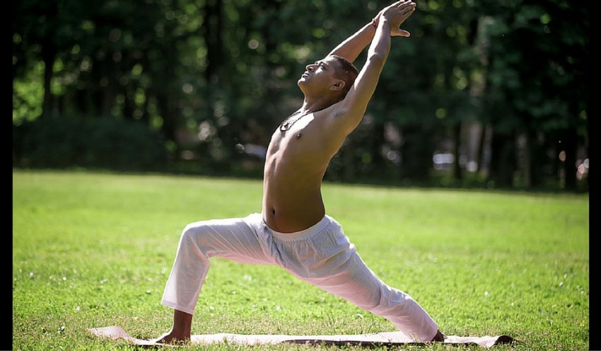 Man practicing yoga in Warrior I Pose (Virabhadrasana I) Man practicing yoga in Warrior I Pose (Virabhadrasana I)