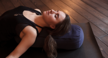 This supported yoga backbend is a great pose for countering the negative effects of text neck.